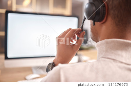 Call center, man and computer screen in office for customer service, sales or evening support. Male agent, consultant or headset microphone for telemarketing, telecom or crm help mockup on technology Call center, man and computer screen in office for customer service, sales or evening support. Male agent, consultant or headset microphone for telemarketing, telecom or crm help mockup on technology 134176973