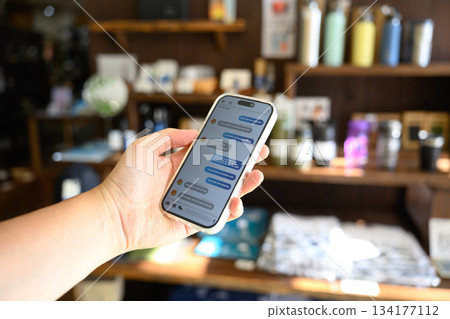 Mobile phone operation General store Mobile phone operation General store 134177112