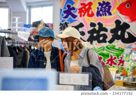 Shopping at a general store 134177192
