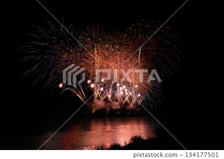 Fireworks reflected in the water 134177501