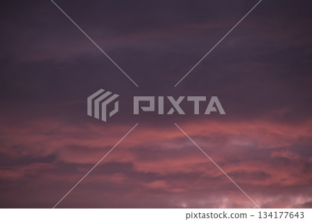 Dark purple pink dramatic sky sunset cloudscape 134177643