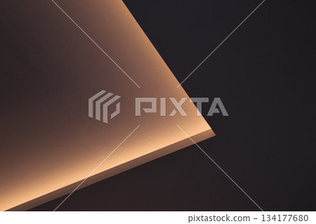 Indirect architectural light abstract ceiling corner design detail. Indirect architectural light abstract ceiling corner design detail. 134177680