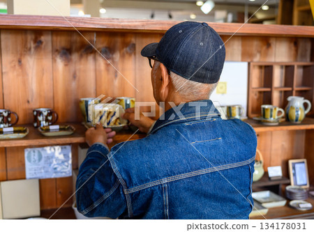 Seniors choosing pottery Seniors choosing pottery 134178031