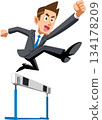A man in a suit jumping over a hurdle 134178209