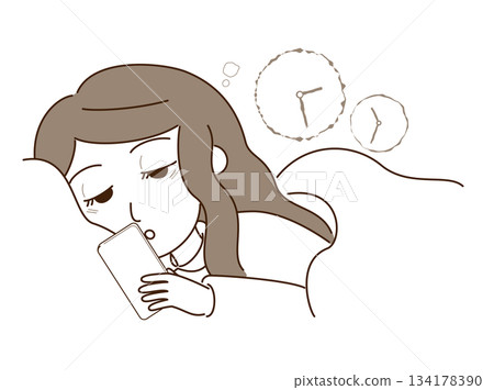 A woman staying up late at night looking at her smartphone A woman staying up late at night looking at her smartphone 134178390