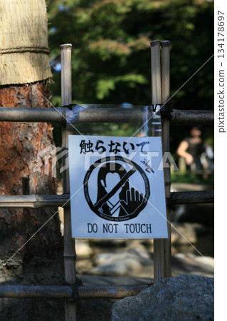 Notices at tourist gardens 134178697