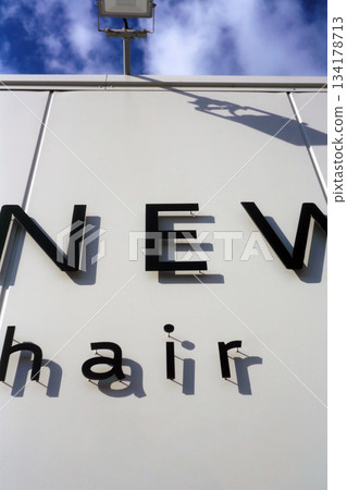 Text sign on the store wall 134178713