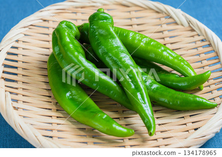 Manganji peppers served in a colander Manganji peppers served in a colander 134178965