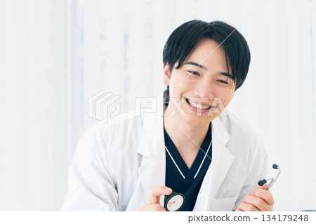 Examining doctor Examining doctor 134179248