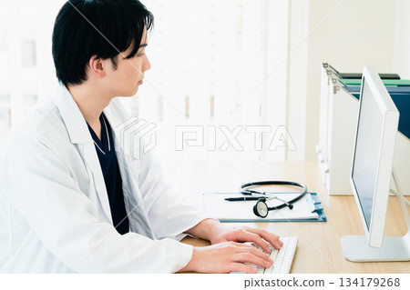 Examining doctor Examining doctor 134179268