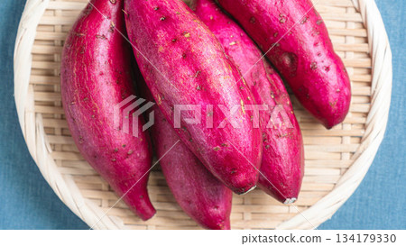 Silk sweet potatoes served on a bamboo basket Silk sweet potatoes served on a bamboo basket 134179330