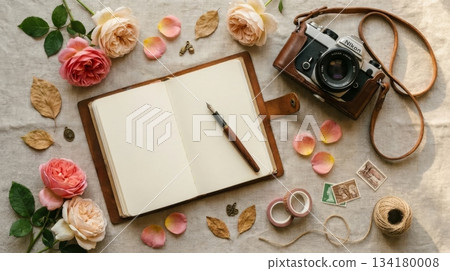 Notebook with Film Camera and Dried Rose 134180008
