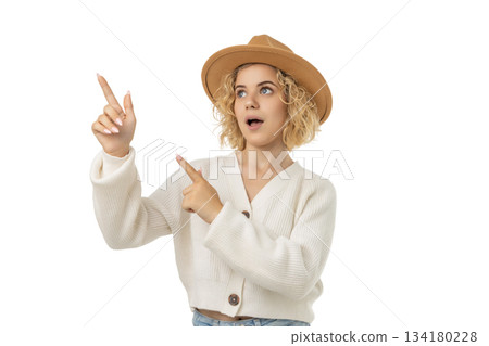 A joyful youth points during winter festivities, isolated, PNG 134180228