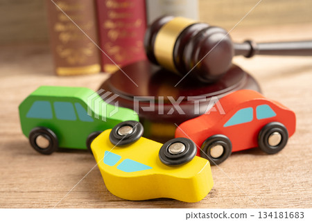 Hammer gavel judge with car vehicle accident, insurance coverage claim lawsuit court case. Hammer gavel judge with car vehicle accident, insurance coverage claim lawsuit court case. 134181683