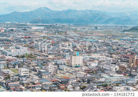 Tendo city with Sakura Cherry Blossom and snow mountain in Spring season, view from Tendo Park or Maizuru Park. Yamagata prefecture, Tohoku, Japan, 21 April 2025 134181772