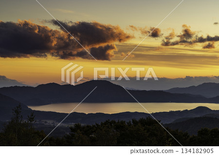 Lake Tazawa in Senboku City, Akita Prefecture, the lake dyed in the setting sun Lake Tazawa in Senboku City, Akita Prefecture, the lake dyed in the setting sun 134182905