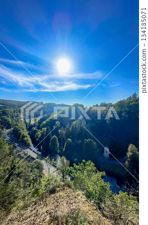 Esch-sur-Sure, Wiltz, Grand-Duche de Luxembourg, September 07, 2025, Sundrenched precipice offering 134185071