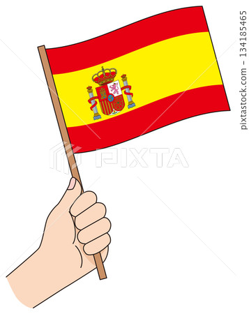 Hand holding a simple flag of Spain Hand holding a simple flag of Spain 134185465