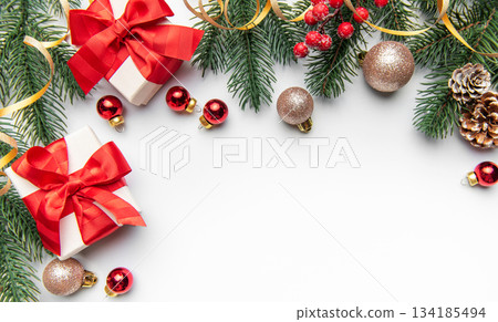 Christmas presents with fir branches and holiday decorations 134185494