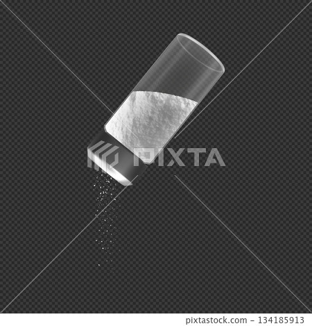 A round glass container with a metal lid pouring salt. Seasoning, ingredient, cooking. A round glass container with a metal lid pouring salt. Seasoning, ingredient, cooking. 134185913