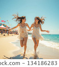 Women running on the beach 134186283