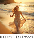 A woman running on the beach 134186284
