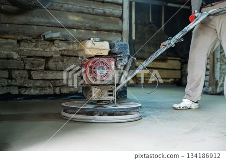Concrete Finishing Polishing the Surface with a Power Trowel for Smooth Results Concrete Finishing Polishing the Surface with a Power Trowel for Smooth Results 134186912