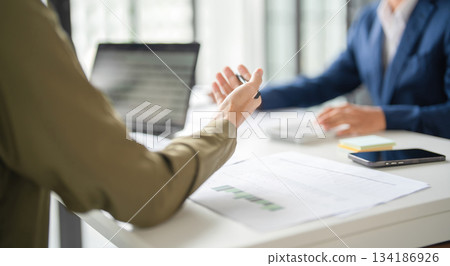 Businessmen drive online store success together. Businessmen drive online store success together. 134186926