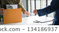 A male employee quits his job. 134186937