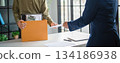 A male employee quits his job. 134186938