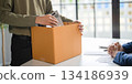 A male employee quits his job. 134186939