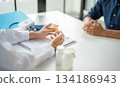 A doctor giving prescription. 134186943