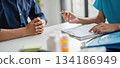 A doctor explaining to patient 134186949