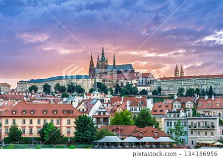 Scenic Prague, Czech Republic Captivating Skyline with St. Vitus Cathedral and Sunset Glow 134186956