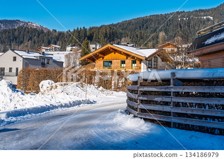 Winter Scenery in Kaprun, Austria Alps Serene Village with Snow-Covered Houses and Mountain Views 134186979