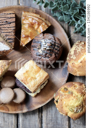 Acacia plate with various baked goods Acacia plate with various baked goods 134186992