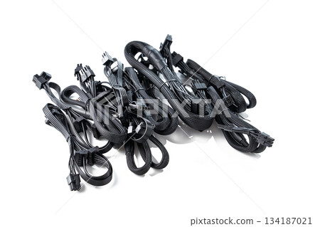 Black Computer Power Supply Cables Isolated on White Background for PC Building. Modern 134187021