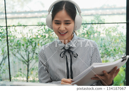 Overjoyed businesswoman happy for successful work. 134187067