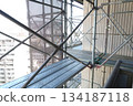 Scaffolding for repair work on the exterior walls of a high-rise apartment building Scaffolding for repair work on the exterior walls of a high-rise apartment building 134187118