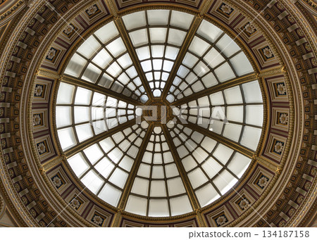 the large glass domed ceiling or skylight that forms part of the ceiling within the main hall or lobby of the National Gallery. the large glass domed ceiling or skylight that forms part of the ceiling within the main hall or lobby of the National Gallery. 134187158