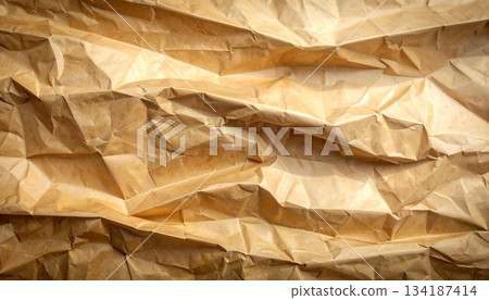 Vintage brown crumpled and folded paper texture background Vintage brown crumpled and folded paper texture background 134187414