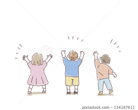 Back view of a child having fun with his hands raised Back view of a child having fun with his hands raised 134187611