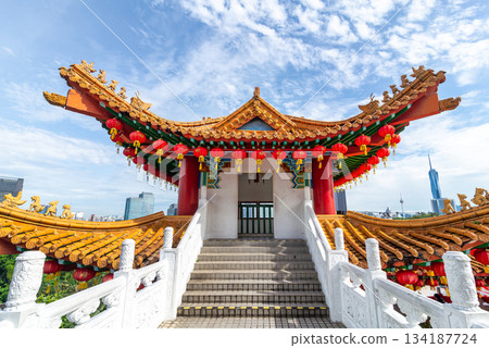 Thean Hou Temple, Chinese temple with red lanterns and ornate roof, overlooking KL Tower and Merdeka 118 in Kuala Lumpur, Malaysia Thean Hou Temple, Chinese temple with red lanterns and ornate roof, overlooking KL Tower and Merdeka 118 in Kuala Lumpur, Malaysia 134187724