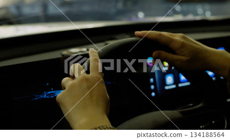Close-up of a man holding car keys, celebrating a new vehicle purchase Close-up of a man holding car keys, celebrating a new vehicle purchase 134188564