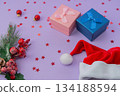Gift boxes with ribbons, Santa hat and Christmas decoration. Christmas and Happy New year 134188594