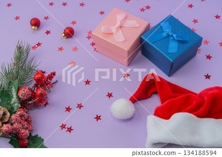 Gift boxes with ribbons, Santa hat and Christmas decoration. Christmas and Happy New year 134188594