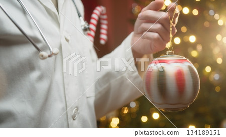 Anonymous Doctor Treats Patients and Wishes Happy Christmas Holidays Anonymous Doctor Treats Patients and Wishes Happy Christmas Holidays 134189151