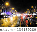 Many cars are driving on the Champs-Élysées in Paris in December 134189289