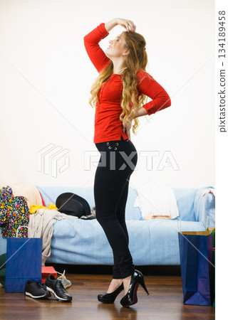 Fashionable woman wearing high heels indoor 134189458