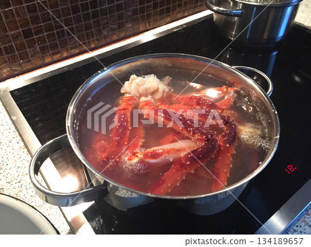 Norway, crab boiling in pan 134189657